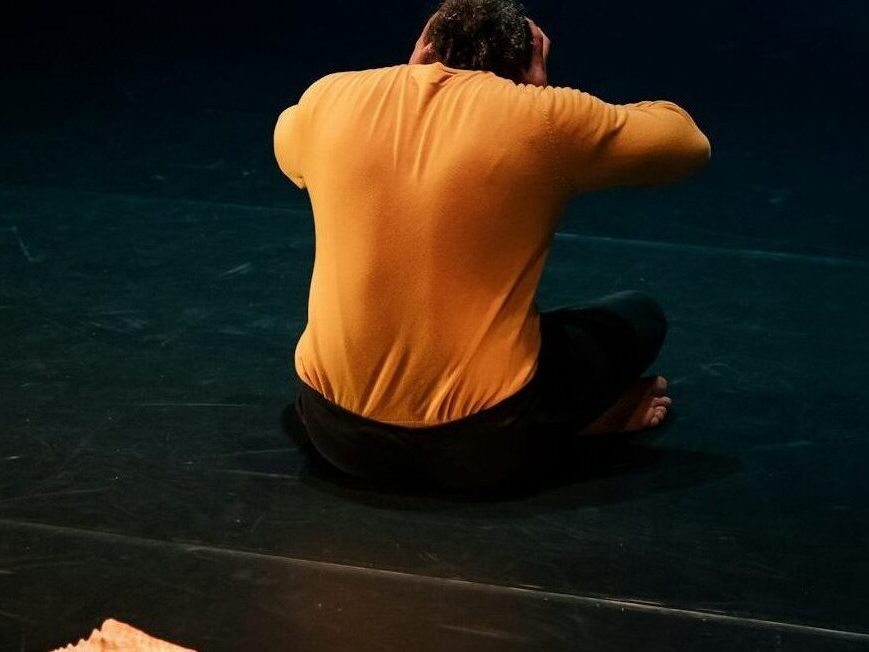 a person sitting on the ground